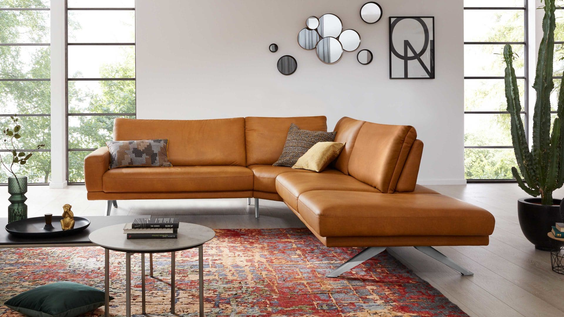 Ecksofa orange in Lederoptik